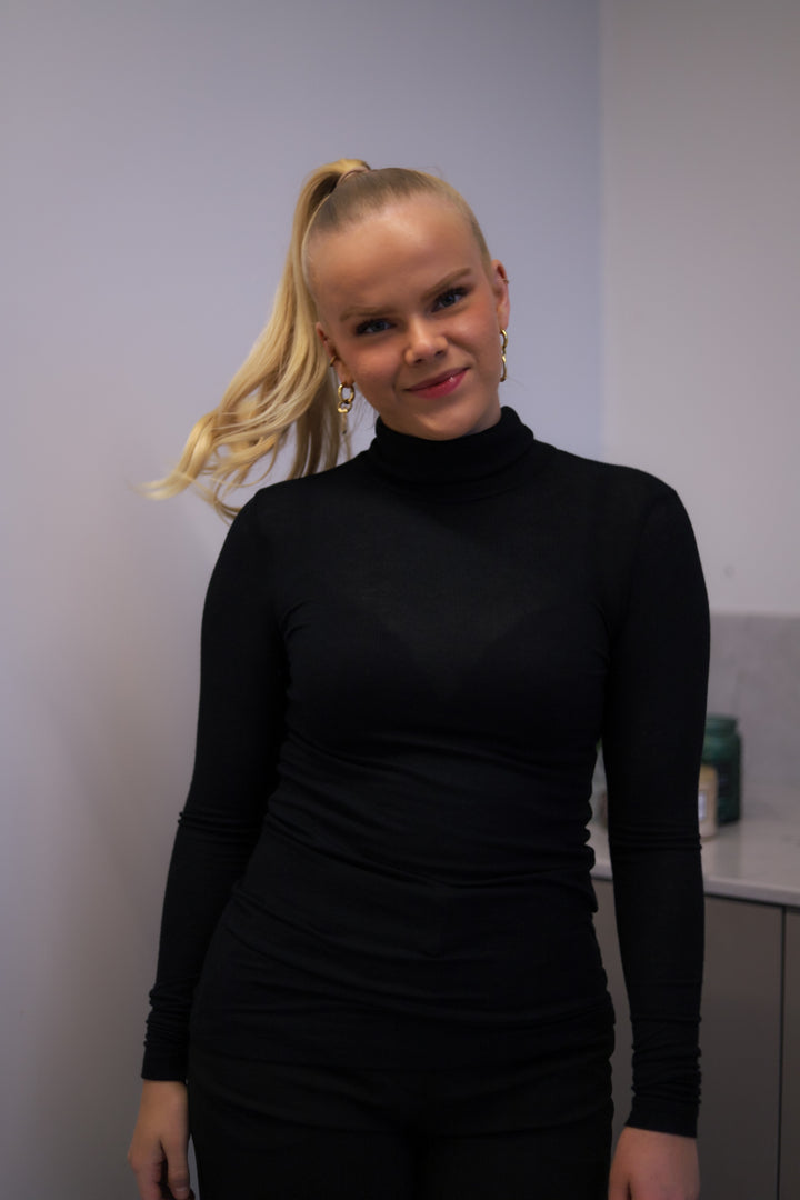 Angela Roll Neck Black