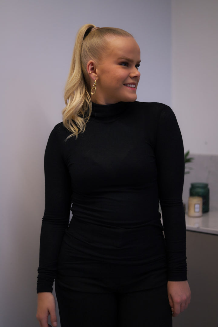 Angela Roll Neck Black