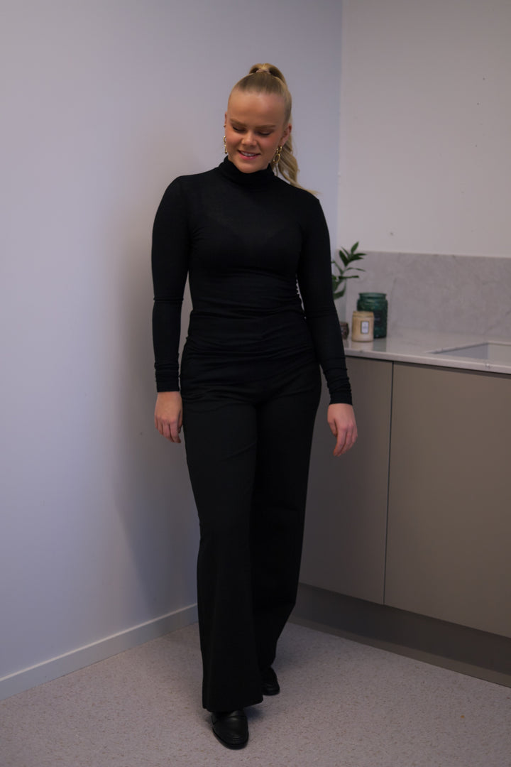 Angela Roll Neck Black